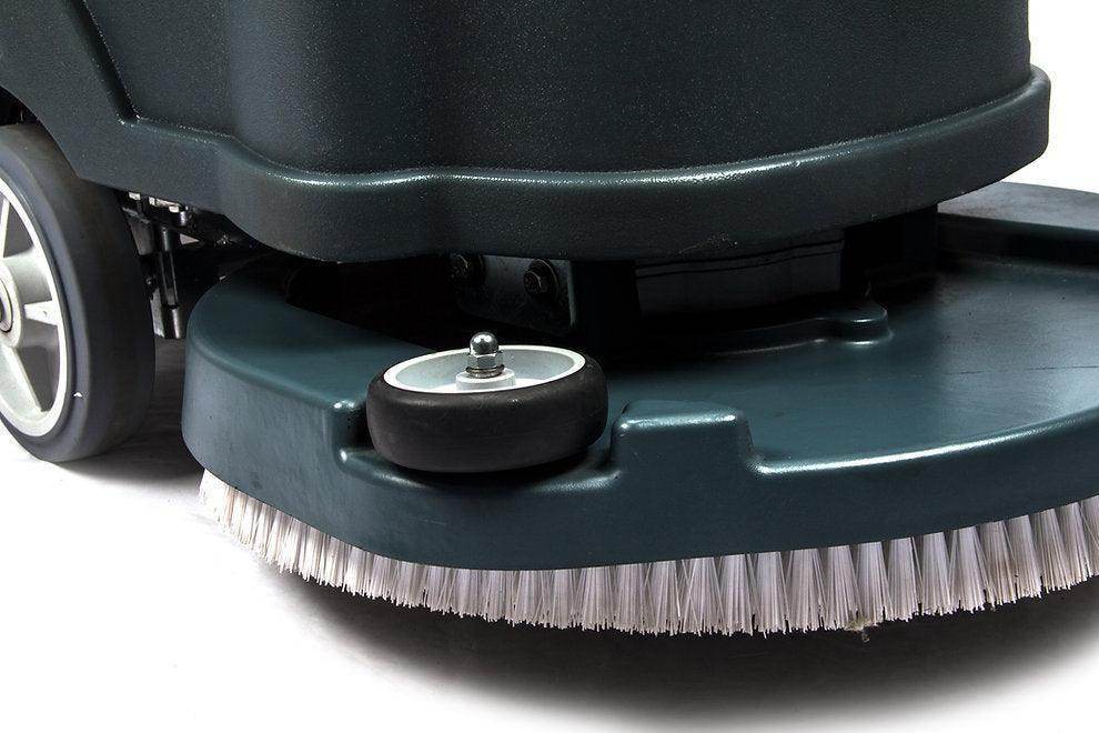 Close-up of the 22-inch brush scrubbing path on the RT50+ battery-powered floor scrubber machine